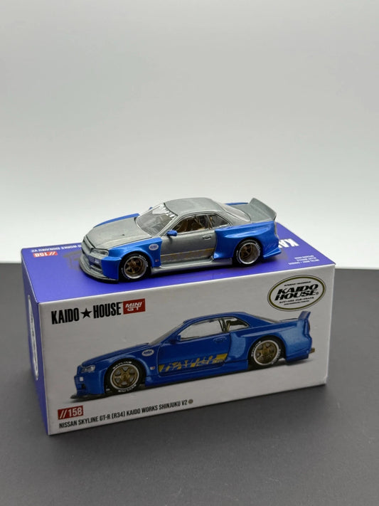 ***CHASE *** MINI GT x Kaido House 1:64 NISSAN SKYLINE GT-R (R34) KAIDO WORKS SHINJUKU V2 - DENT IN BOX KHMG138 ***CHASE*** (Copy)